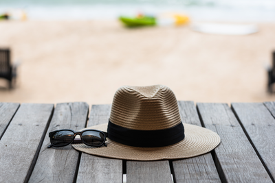 hat and sunglasses